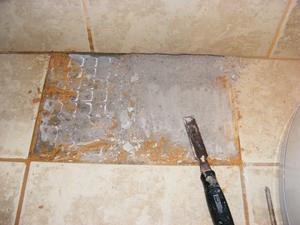 Use an Old Chisel to Remove Existing Tile-Set